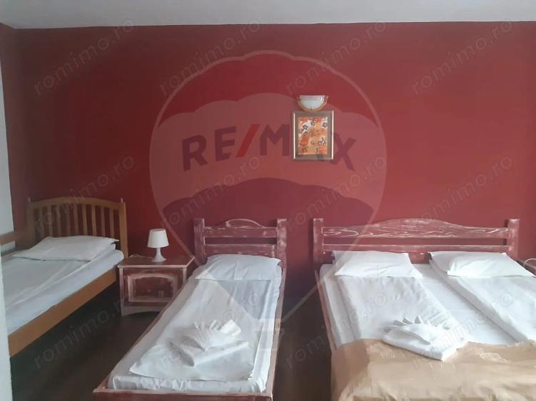 Casă cu 18 camere cu Teren 2880 Mp în Moieciu