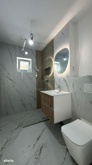 Apartament cu 4 camere decomandat în Dâmbovița