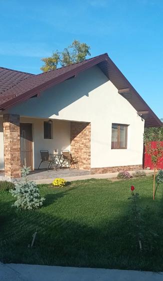 Casă cu Teren 1000 Mp în Bucu