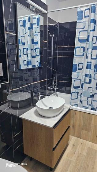 Apartament cu 2 camere, mobilat în Central