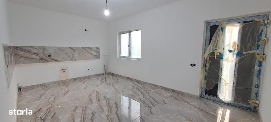 Casă cu 4 camere în Dragomirești-Deal