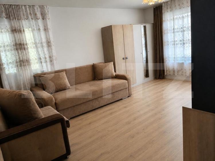 Apartament cu 2 camere decomandat în Tractorul