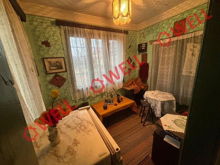 Casă cu 2 camere cu Teren 1189 Mp în Brețcu