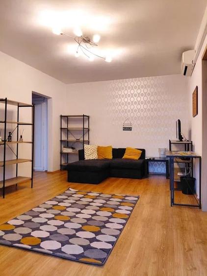Apartament cu 2 camere semidecomandat, mobilat în 1 Mai