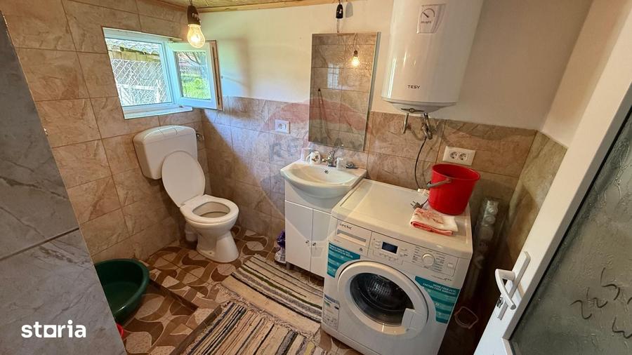 Casă cu 5 camere cu Teren 1300 Mp în Vulturu