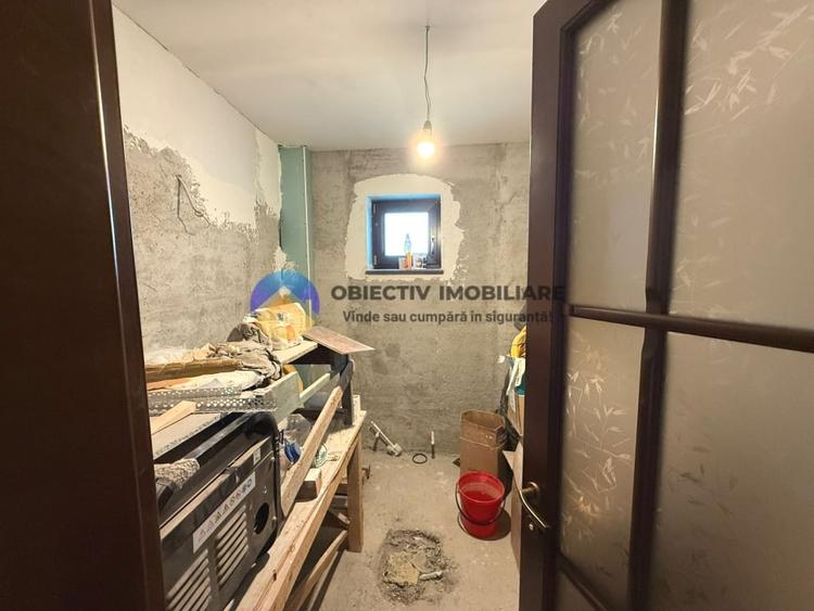 Casă individuală cu 5 camere cu Teren 2000 Mp în Gârcina