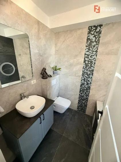 Apartament cu 3 camere decomandat, mobilat în Badea Cârțan