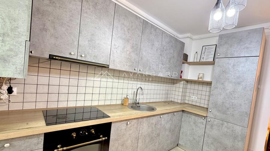 Apartament cu 2 camere semidecomandat, mobilat în Borhanci