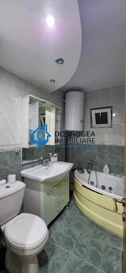 Apartament cu 3 camere decomandat în E3
