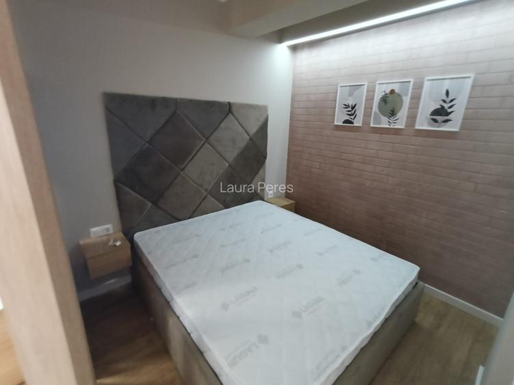 Inchiriez apartament cu o camera si parcare subterana