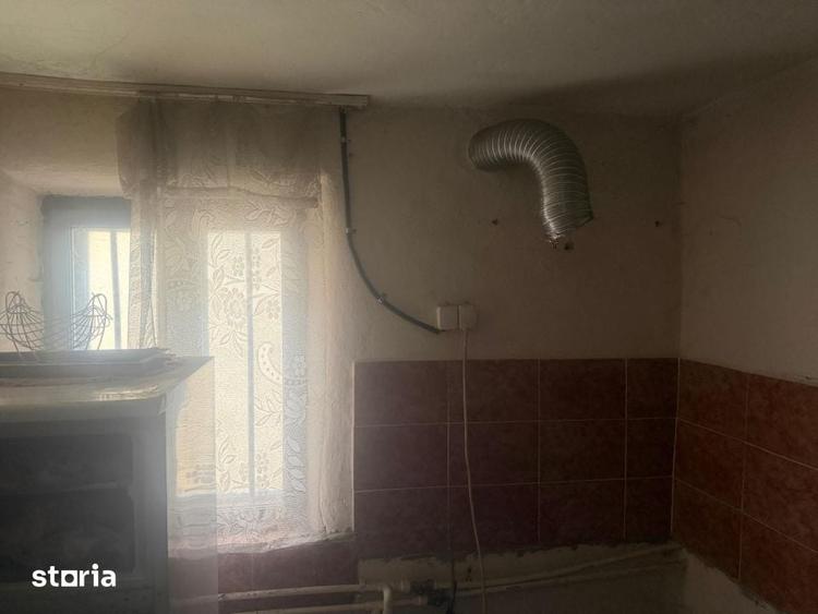 Casă cu 2 camere cu Teren 1000 Mp în Central