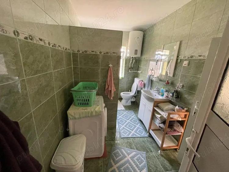 Casă cu 3 camere cu Teren 1500 Mp în Central