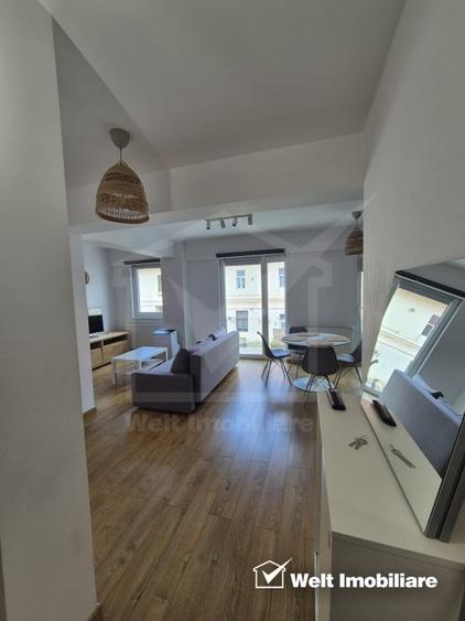 Apartament cu 3 camere semidecomandat, mobilat în Central