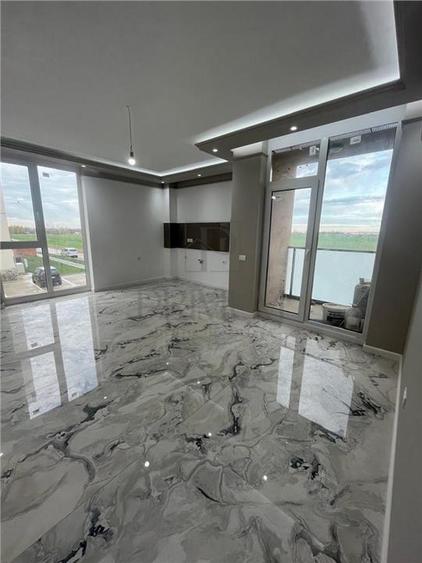 Apartament cu 3 camere decomandat în Torontalului