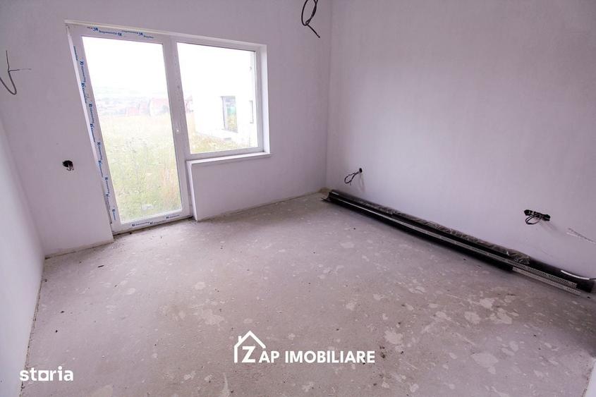 Casă cu 4 camere în Corunca