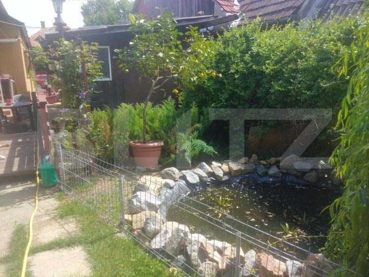 Casă individuală cu 4 camere cu Canalizare în Dâmbul Rotund