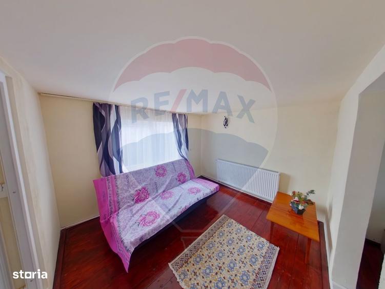 Casă cu 4 camere cu Teren 938 Mp în Sud