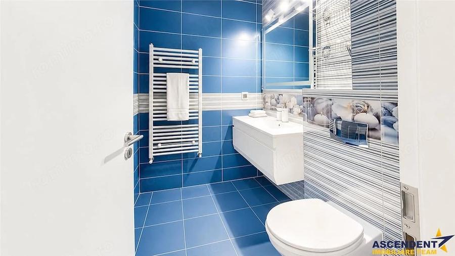 Apartament cu 3 camere decomandat în Tractorul