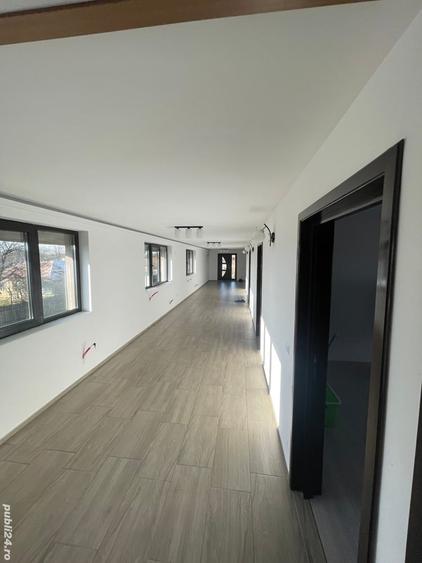 Casă cu 6 camere cu Teren 600 Mp în Moldoveni