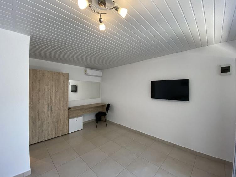 Casă cu 4 camere cu Teren 1400 Mp în Central