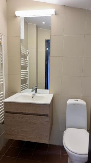 Casă cu 4 camere cu Garaj în Tunari
