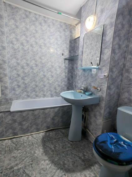 Apartament cu 3 camere decomandat în Coman
