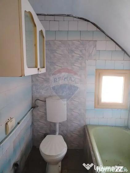 Casă cu 4 camere cu Teren 3370 Mp în Central