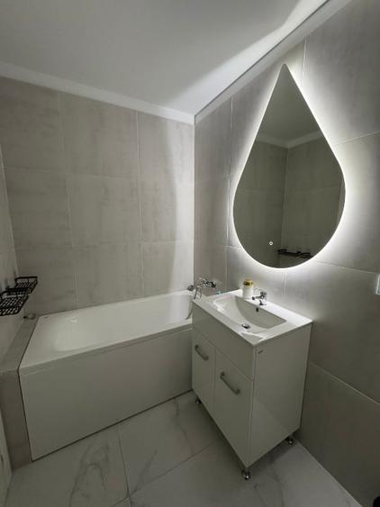 Apartament cu 2 camere semidecomandat, mobilat în Central