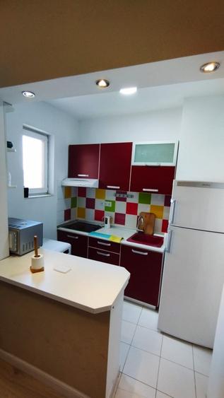 Apartament cu 2 camere semidecomandat, mobilat în P-ța Romană — fotografia 2