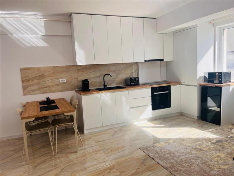 Apartament cu 2 camere semidecomandat, mobilat în Calea București