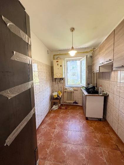 Apartament cu 3 camere semidecomandat în Alexandru cel Bun