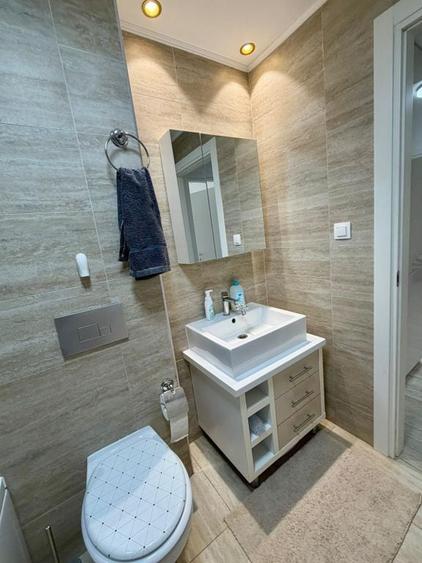 Apartament cu 3 camere semidecomandat în Ștefăneștii de Jos