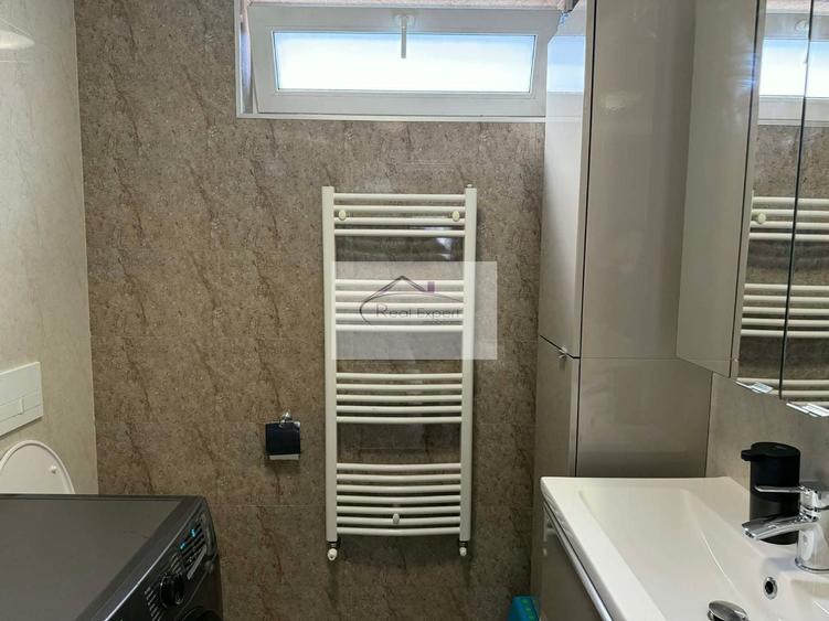 Apartament cu 3 camere decomandat în Europa