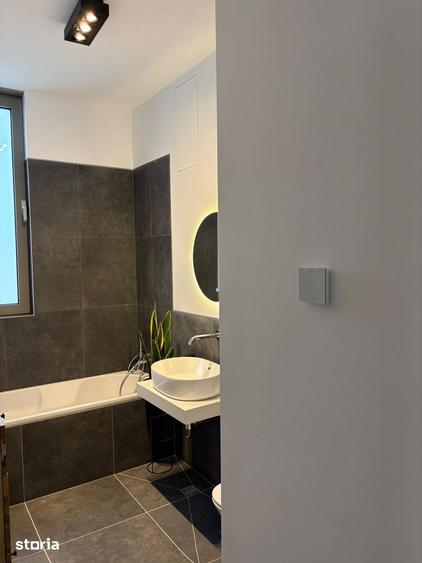 Casă cu 4 camere cu Teren 310 Mp în Tunari