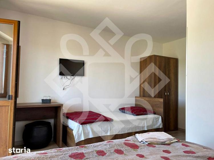 Casă cu 7 camere cu Teren 870 Mp în Sânmartin