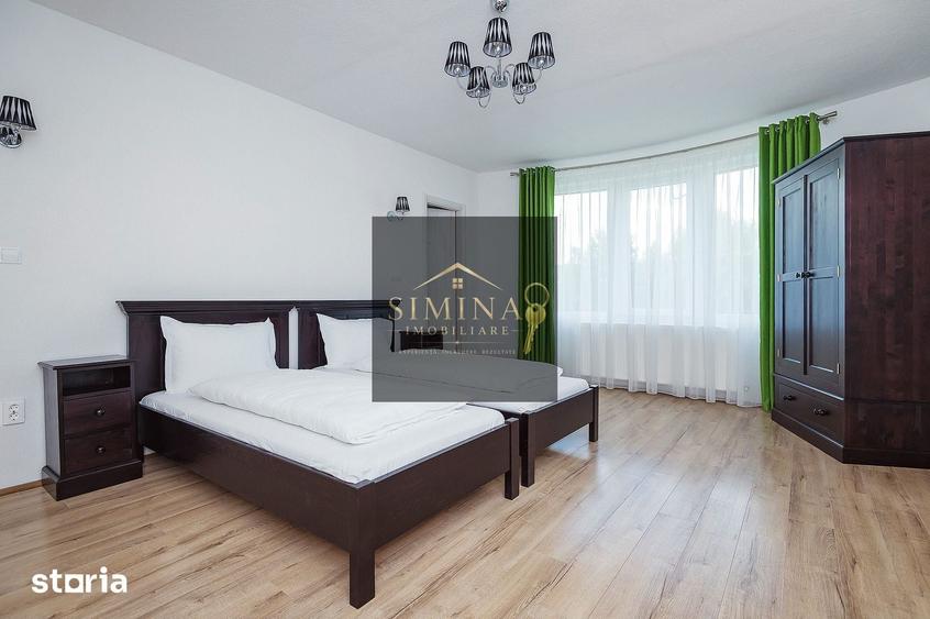 Casă cu 9 camere cu Teren 1000 Mp în Păsăreni