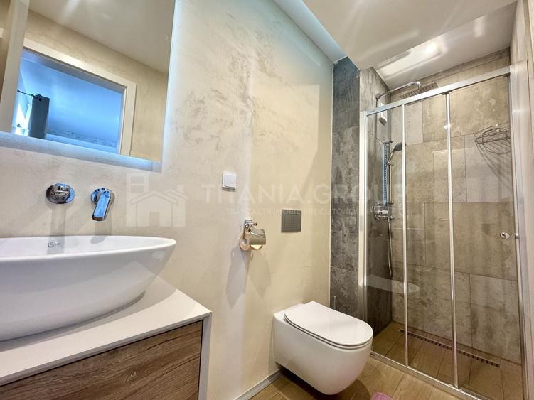 Apartament cu 3 camere semidecomandat, mobilat în Tractorul