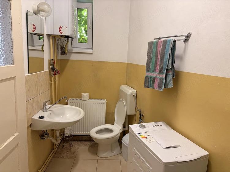 Casă cu Teren 200 Mp în Central