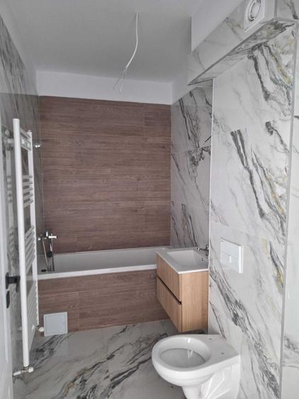 Apartament cu 3 camere decomandat în Cristian