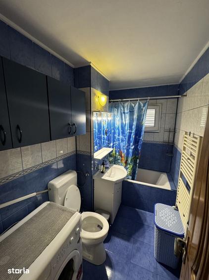 Apartament cu 3 camere decomandat în Tractorul