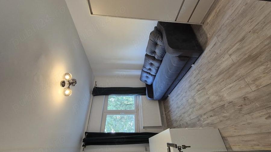 Apartament cu 4 camere decomandat în Central