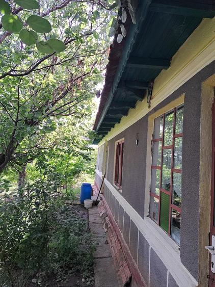 Casă cu 4 camere cu Teren 1280 Mp în Sinești