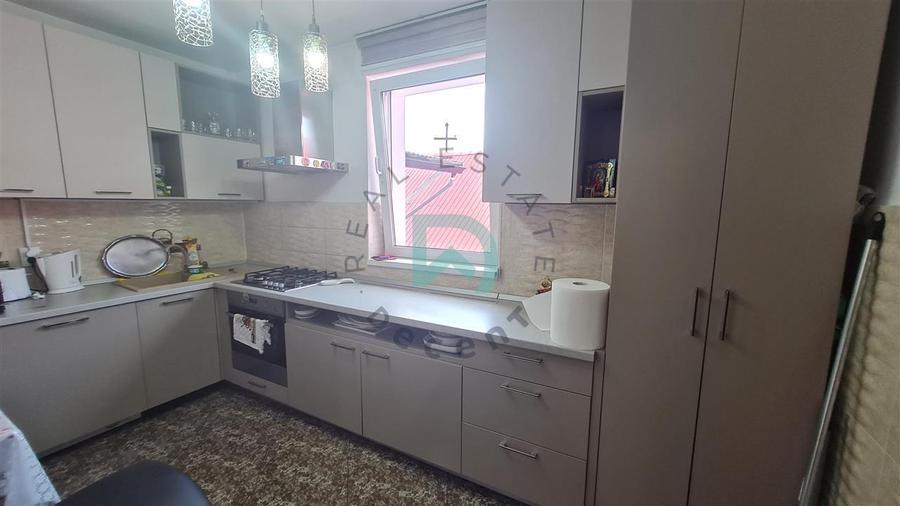 Casă individuală cu 4 camere cu Teren 220 Mp în Răcădău