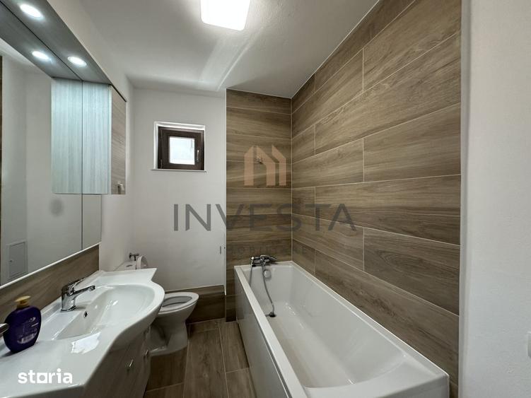 Apartament cu 3 camere semidecomandat în Borhanci