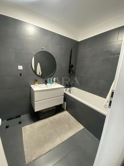 Apartament cu 2 camere semidecomandat, mobilat în Baciu