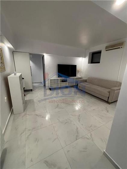 Apartament cu 2 camere semidecomandat, mobilat în Moșilor