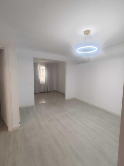 Apartament cu 2 camere semidecomandat în Cățelu