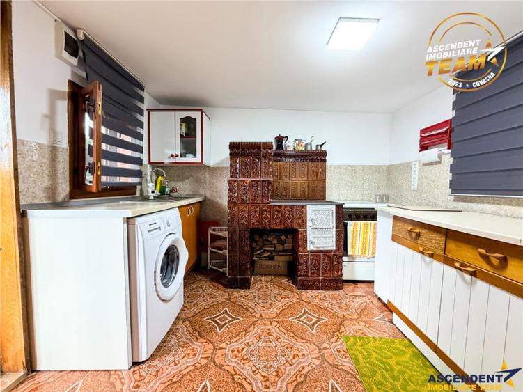 Casa cu teren generos de 1.315 mp, bucatarie de vara complet - 12