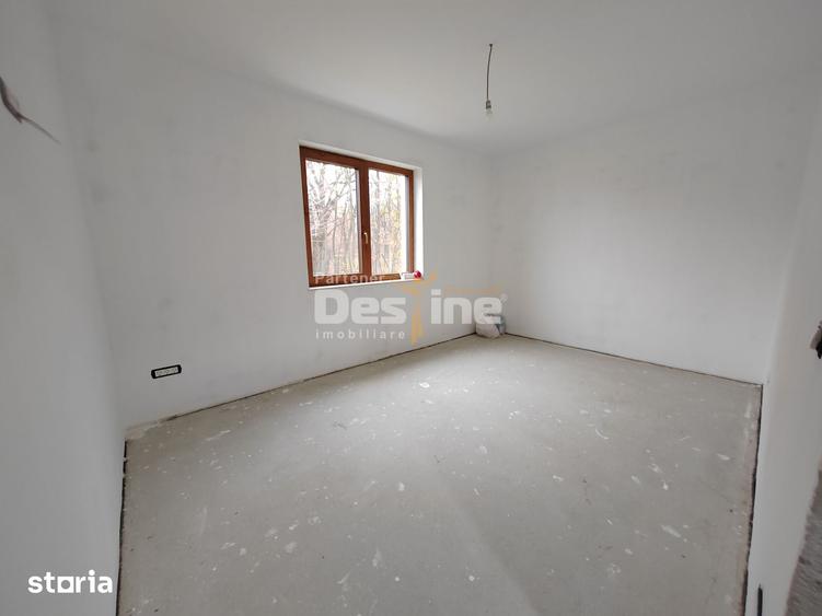 Casă cu 4 camere cu Teren 1000 Mp în Bucium