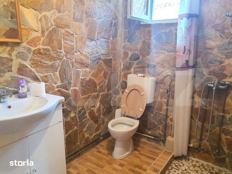 Casă cu 4 camere decomandat cu Teren 1000 Mp în Petrești